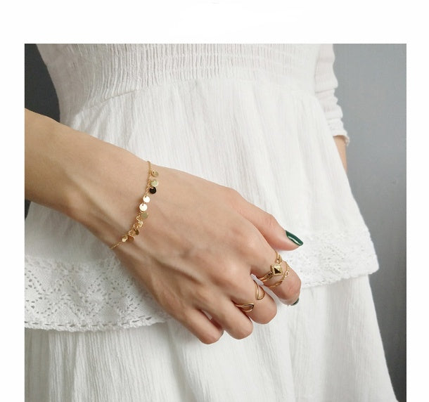 Gold round bracelet