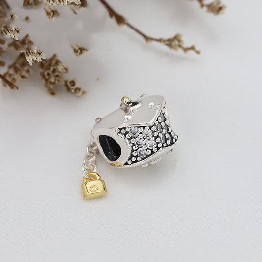 Gold love tassel pendant