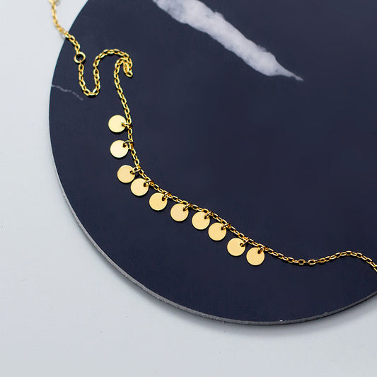 Gold round bracelet