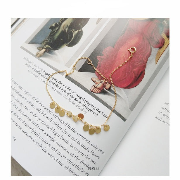 Gold round bracelet