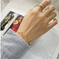 Gold round bracelet