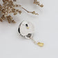 Gold love tassel pendant
