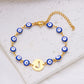Women's High-grade Stainless Steel Blue Eyes Fashion Hollowed-out 26 Letter Bracelet